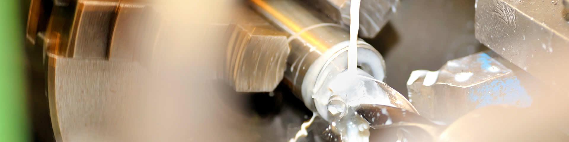 Technical Services - a machine tool drilling a metallic part.